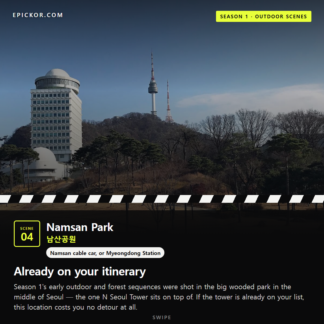 N Seoul Tower above the wooded hillside of Namsan Park