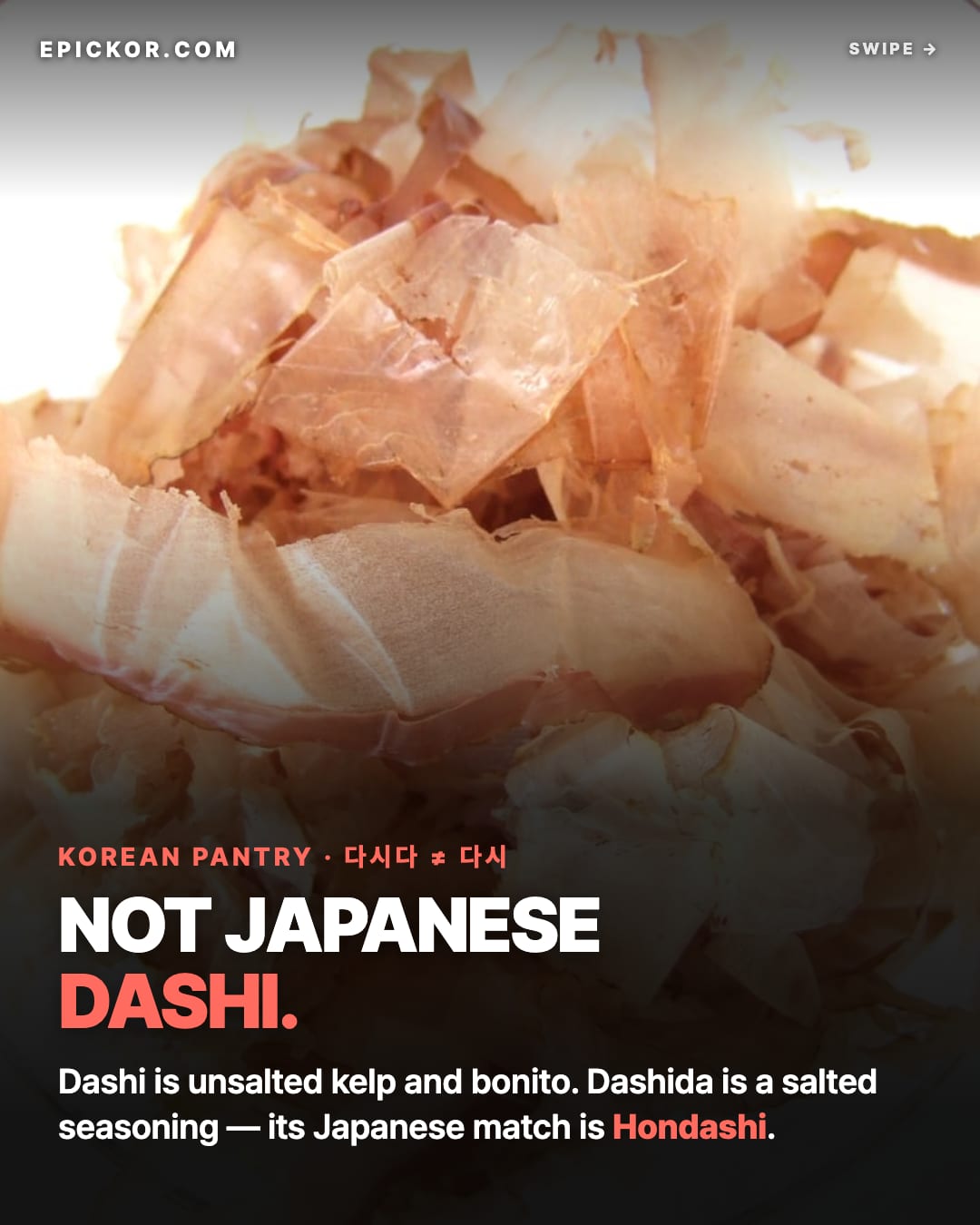 Dried bonito flakes (katsuobushi) heaped in a glass bowl — one half of Japanese dashi stock (Sakurai Midori, Wikimedia Commons)