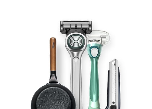 Dorco's product families in one official visual: a kitchen pan, men's and women's razor systems, and a stationery box cutter.