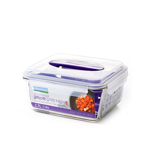 A Glasslock kimchi storage container, a large square tempered glass box with a purple handled lid and a Korean-language label showing kimchi.