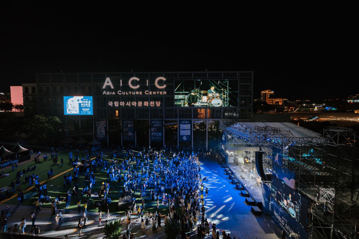An outdoor concert crowd enjoying live music at Asia Culture Center.