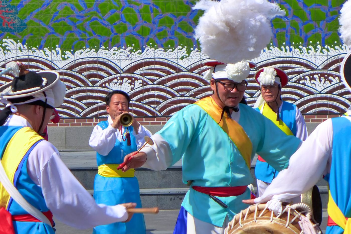 Pungmul performers playing drums and wind instruments in Insadong, Seoul.