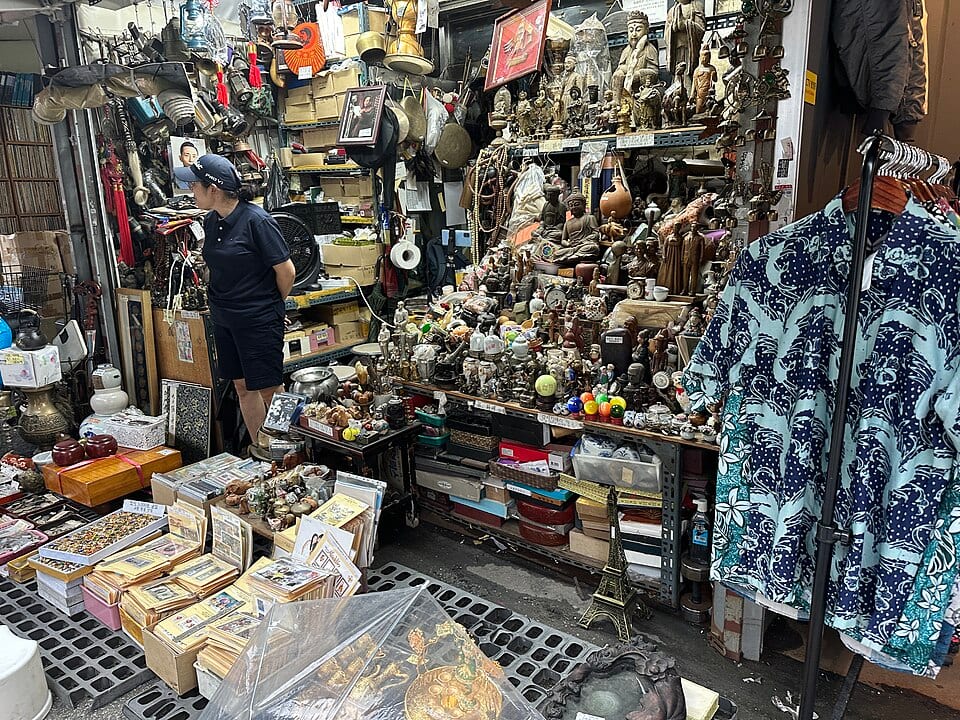 A tightly packed secondhand stall at Dongmyo Flea Market in Seoul