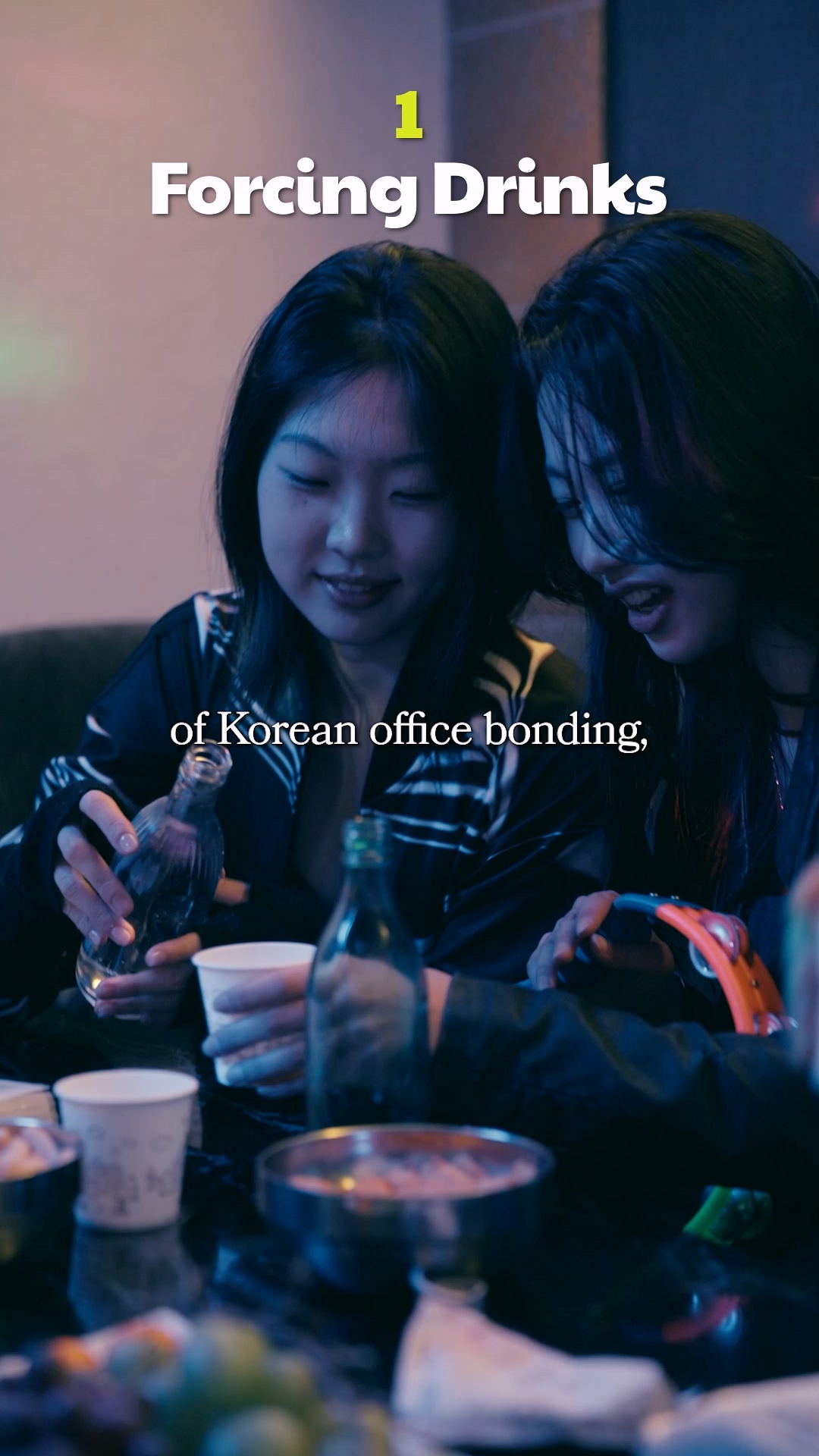 Neon signs of bars and pubs in a busy Seoul nightlife district