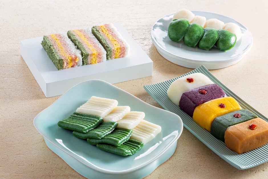 Assorted Korean tteok in several colors and shapes