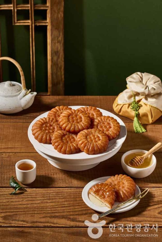 Flower-shaped Korean yakgwa cookies arranged as a traditional sweet