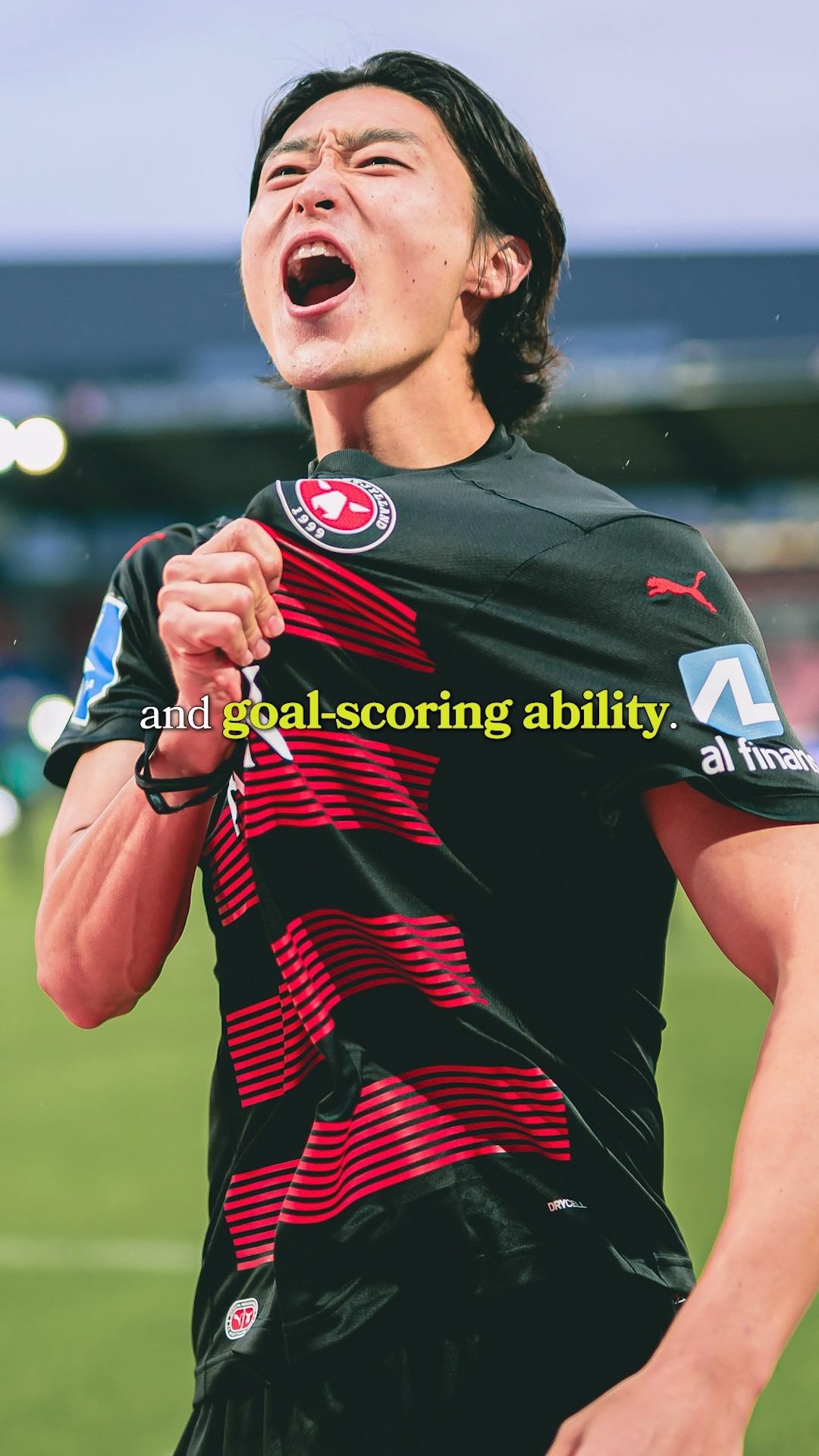 Kim Min-jae making a powerful tackle on the field