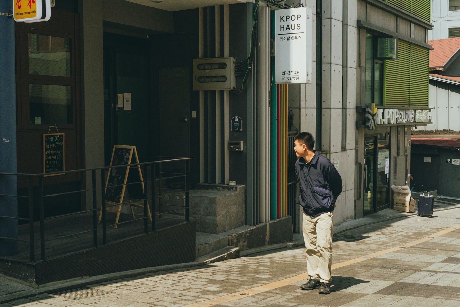A K-pop-themed storefront on a Seoul street