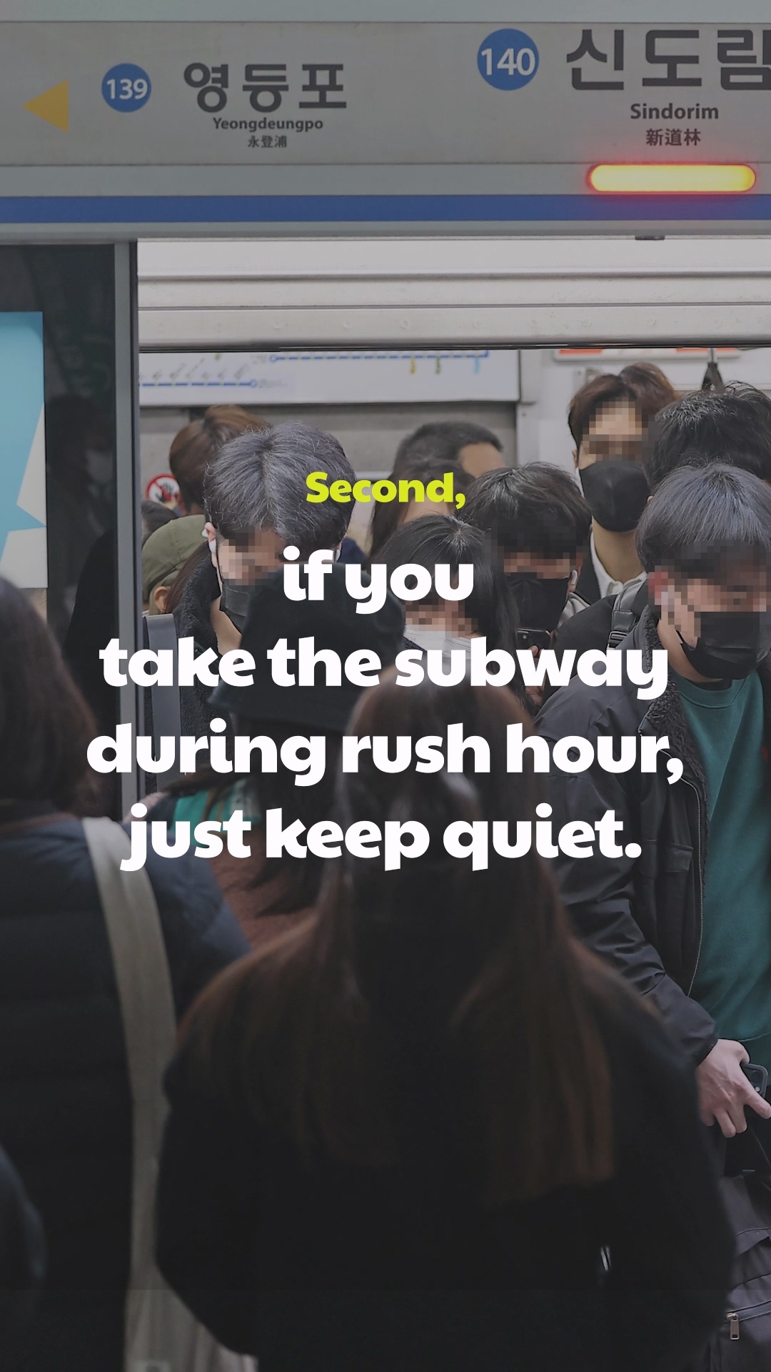 Crowded Seoul subway during rush hour with everyone on their phones