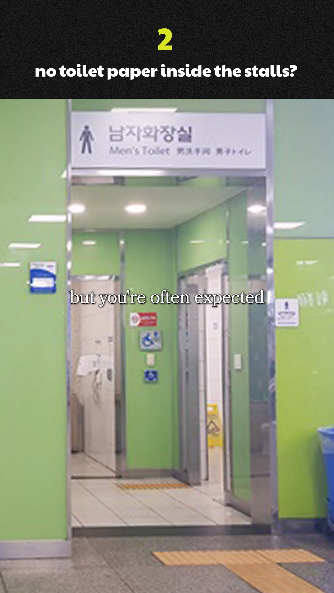 Cleaning staff maintaining a subway restroom