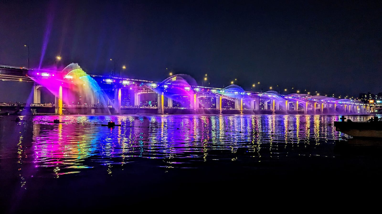 Banpo Bridge Moonlight Rainbow Fountain illuminated at night.