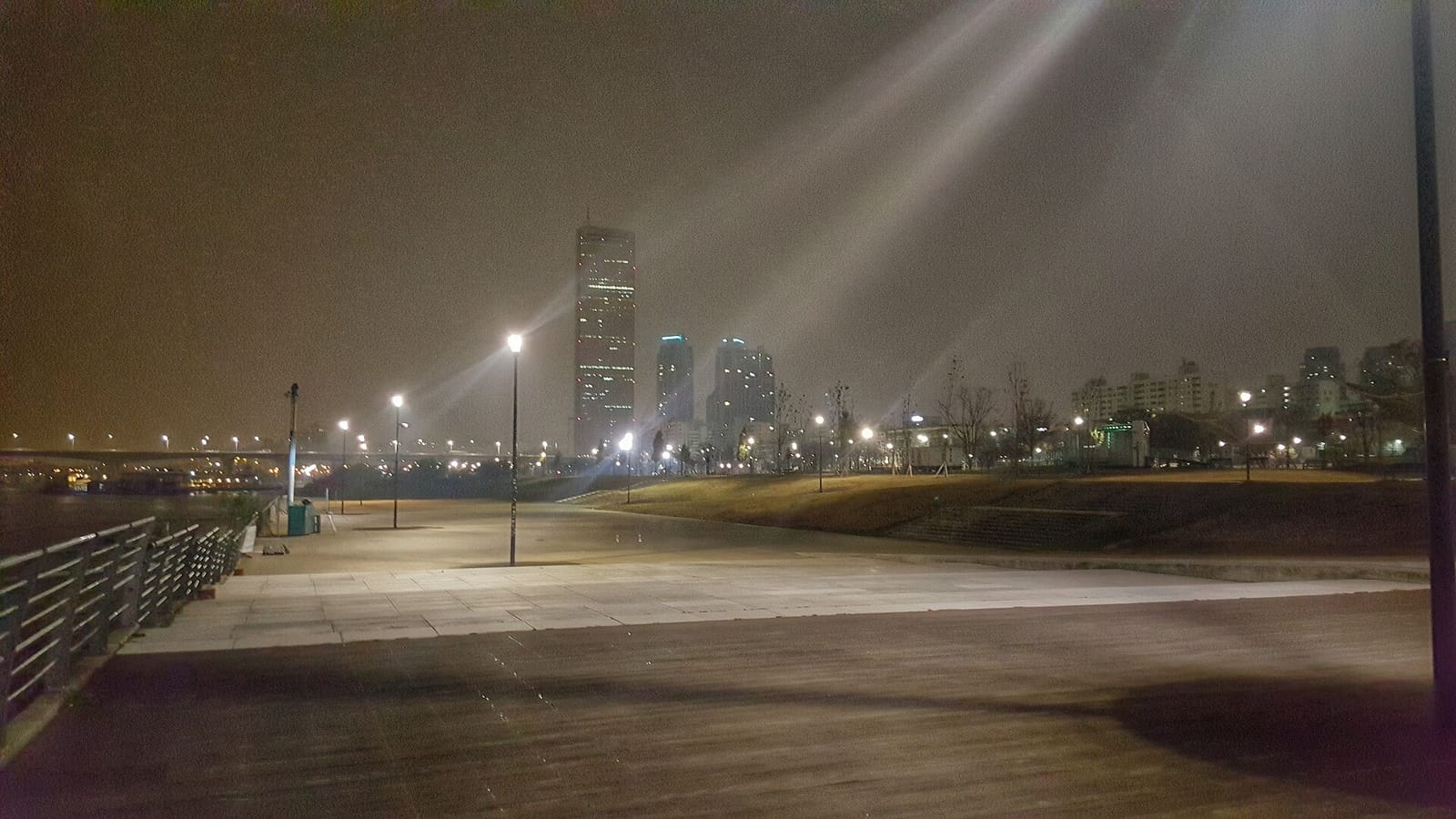 Yeouido Hangang Park and the 63 Building at night.