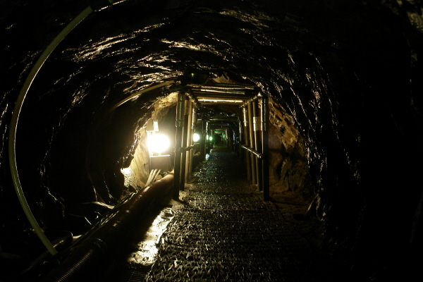 Dark rock passage inside the Third Infiltration Tunnel visitor route
