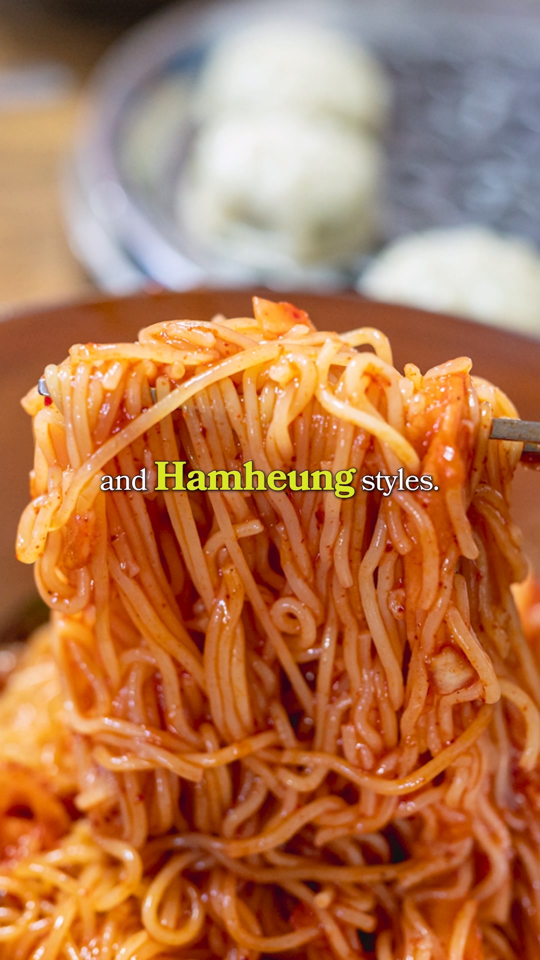 A close up of the icy, slushy broth of a Naengmyeon