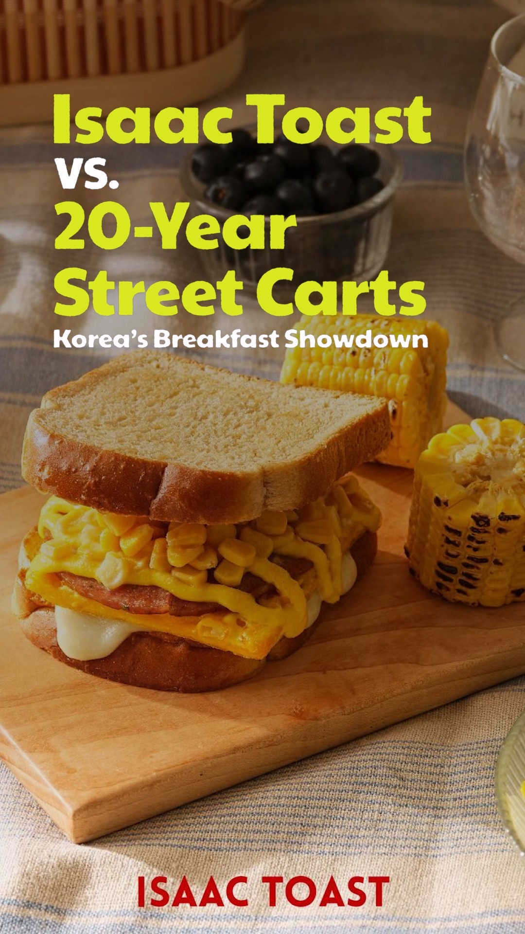 A fresh, steaming Isaac Toast being wrapped in paper