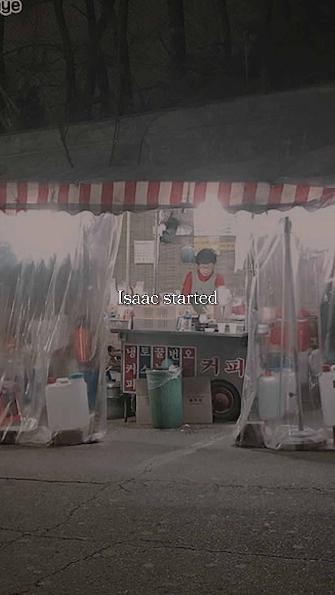 A queue of tourists waiting in front of an Isaac Toast stall