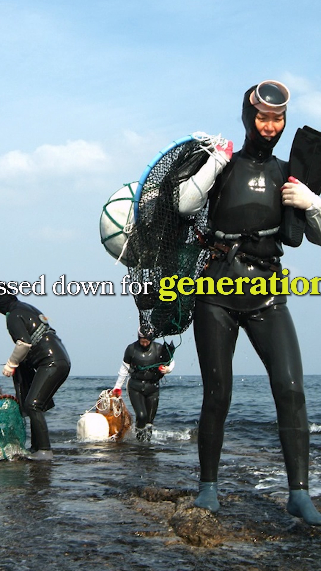 Haenyeo sitting around a fire in a traditional Bulteok