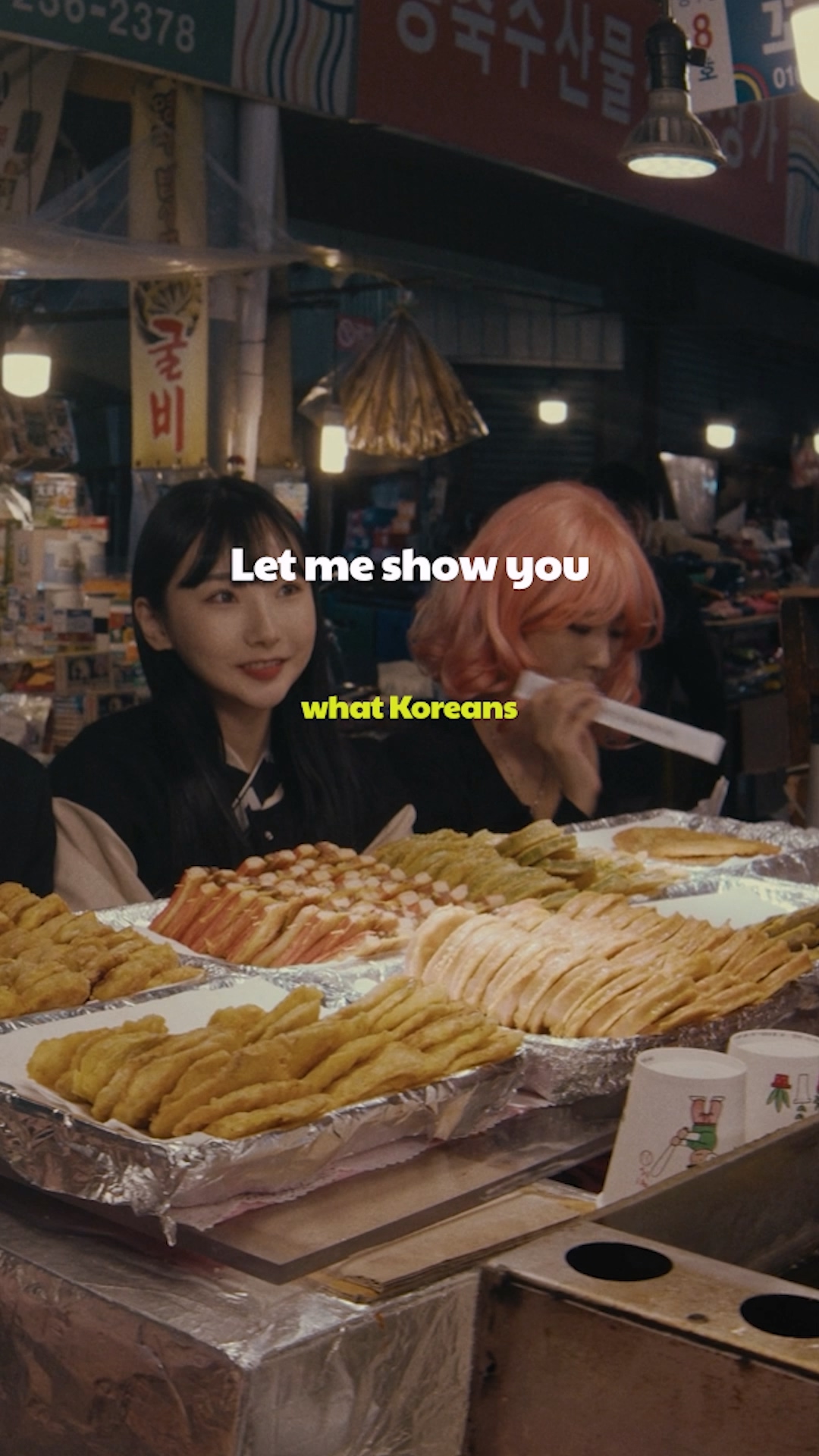 Traditional brass bowls filled with milky Makgeolli