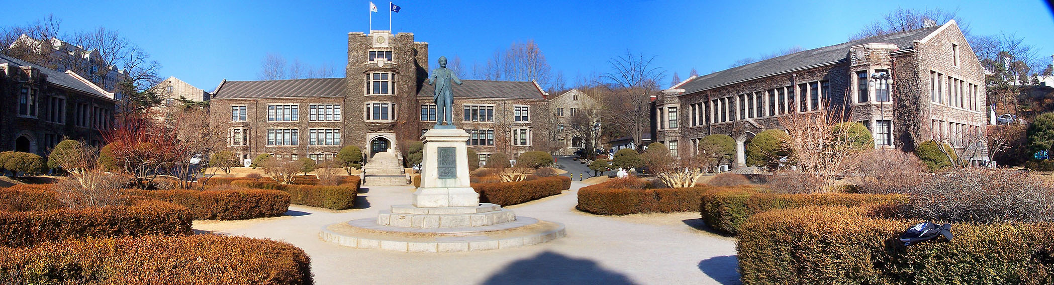Yonsei University's main building in Seoul, representing the campus spaces where classes, festivals, clubs, and alumni identity overlap.