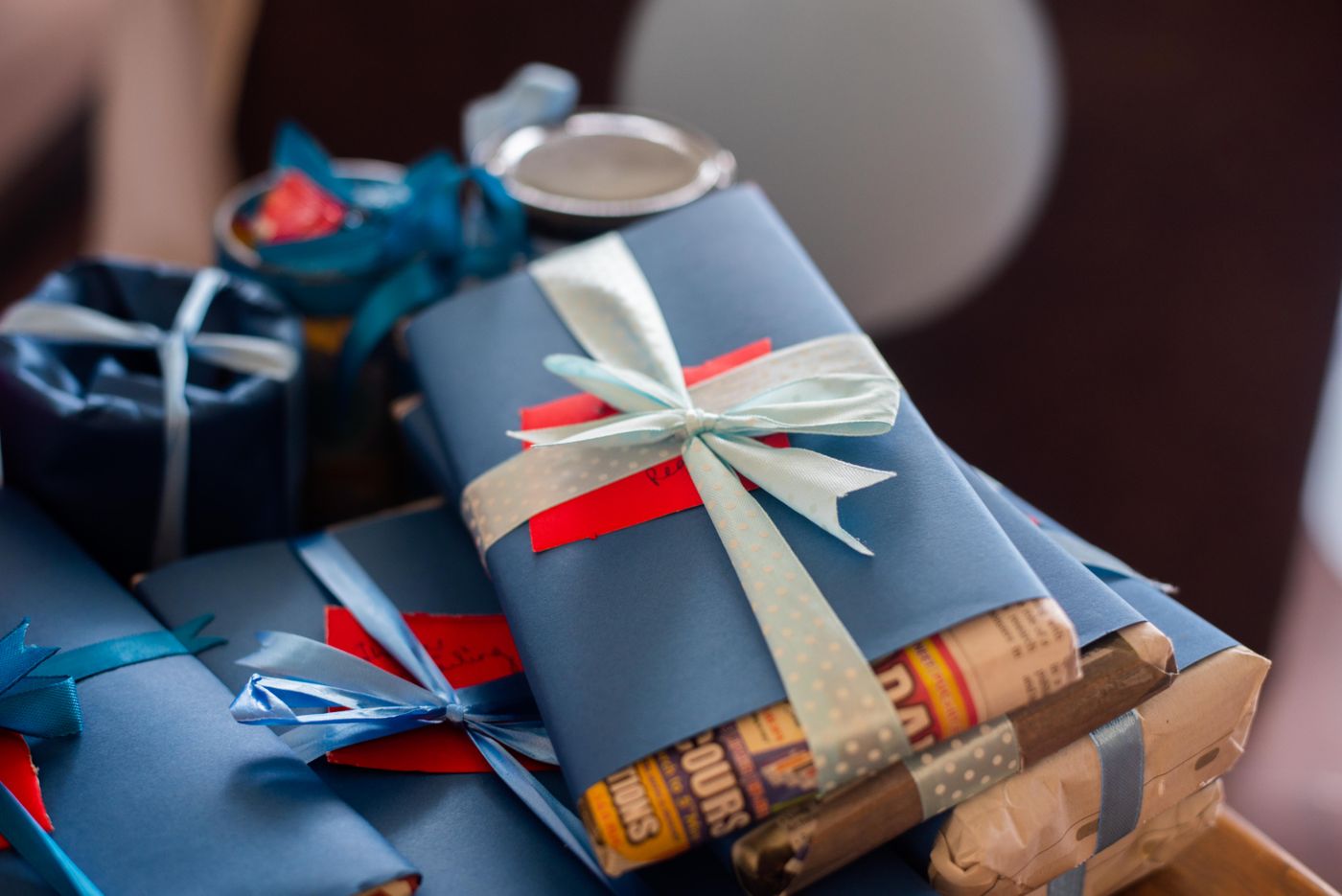 Wrapped gifts with simple ribbons, a neutral reminder that presentation often shapes how a gift feels before it is opened.