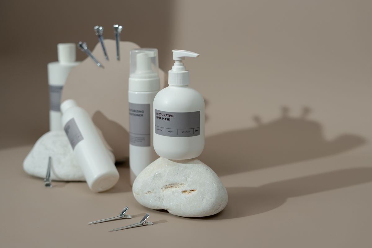 A display of haircare products including shampoo and conditioner bottles, representing the at-home routine tourists may consider after a Seoul head spa.