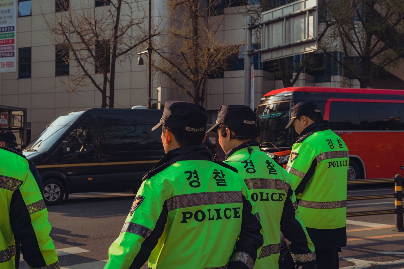 Korean police on a Seoul street, a reminder that valuables may eventually move into official lost-property channels.