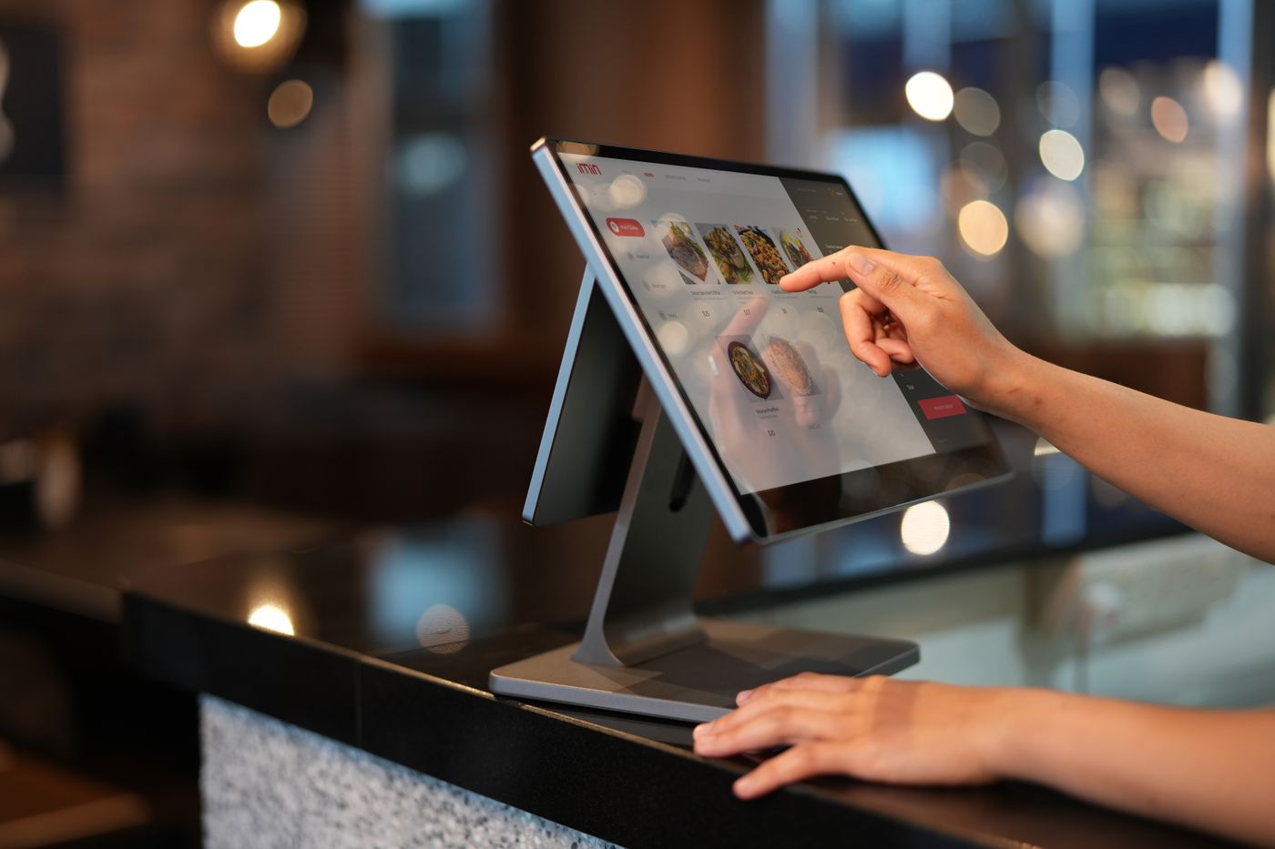 A restaurant touchscreen terminal similar to the waiting tablets and reservation screens tourists may meet before a Seoul meal.