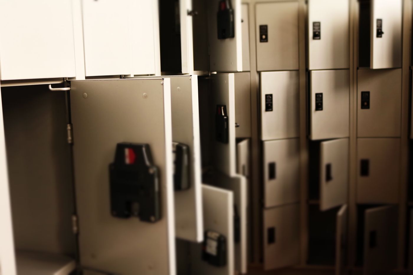 A row of storage lockers, showing the kind of short-term luggage solution travelers may use between check-out and evening plans.