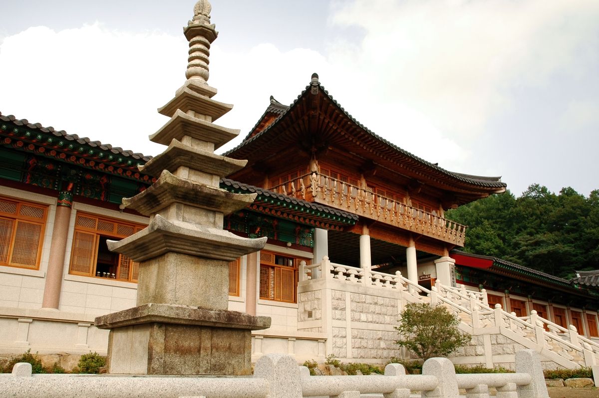 A Korean temple in Hapcheon with a stone pagoda and traditional architecture.