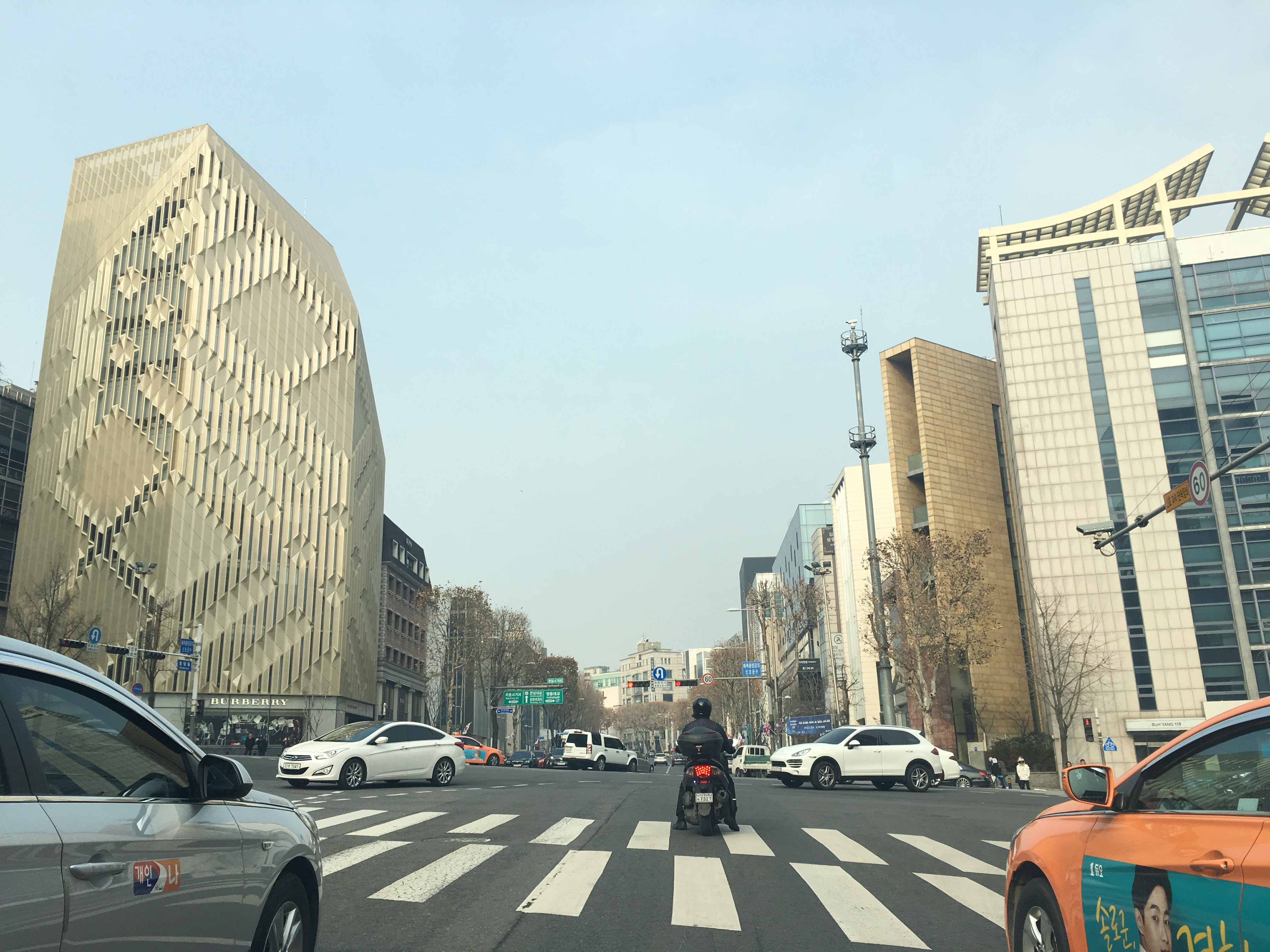 Cheongdam Fashion Street area in Seoul with luxury retail buildings.