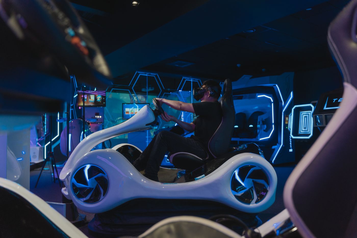 A VR motorbike simulator, showing the arcade side of indoor screen sports.