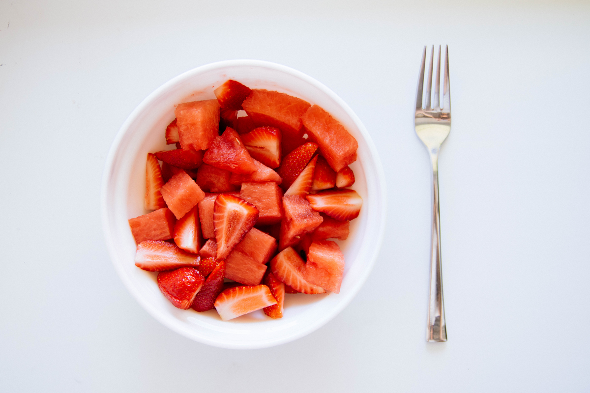 A bowl of watermelon and strawberries, the easiest fruit combination for a Korean-style summer punch.
