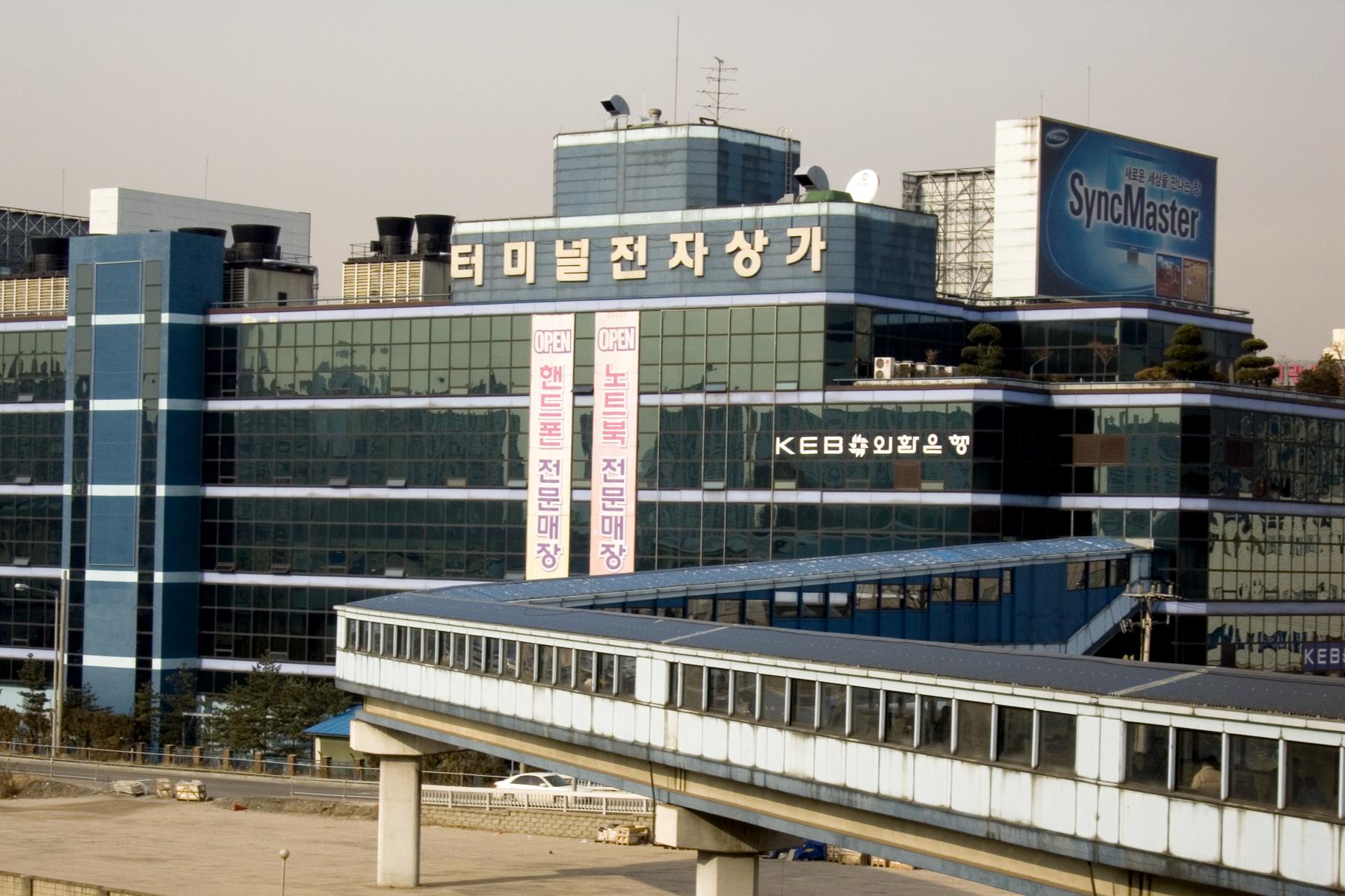 Yongsan Electronics Market terminal shopping center building in Seoul with Korean electronics signage.