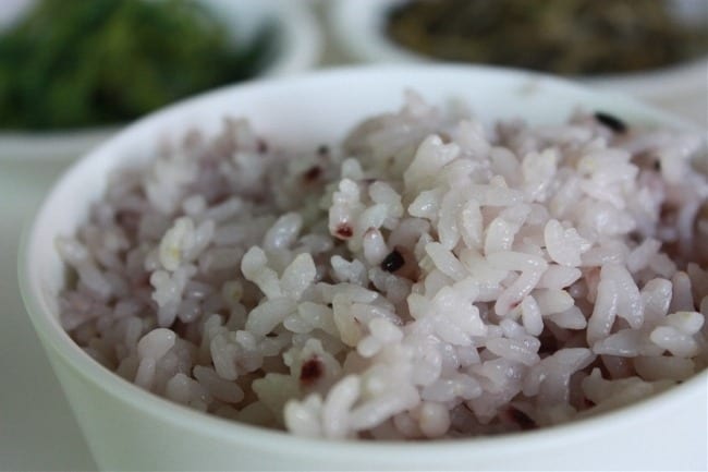 A bowl of cooked Korean rice, the base that makes sauces, gim, eggs, and stews work together in a starter pantry.