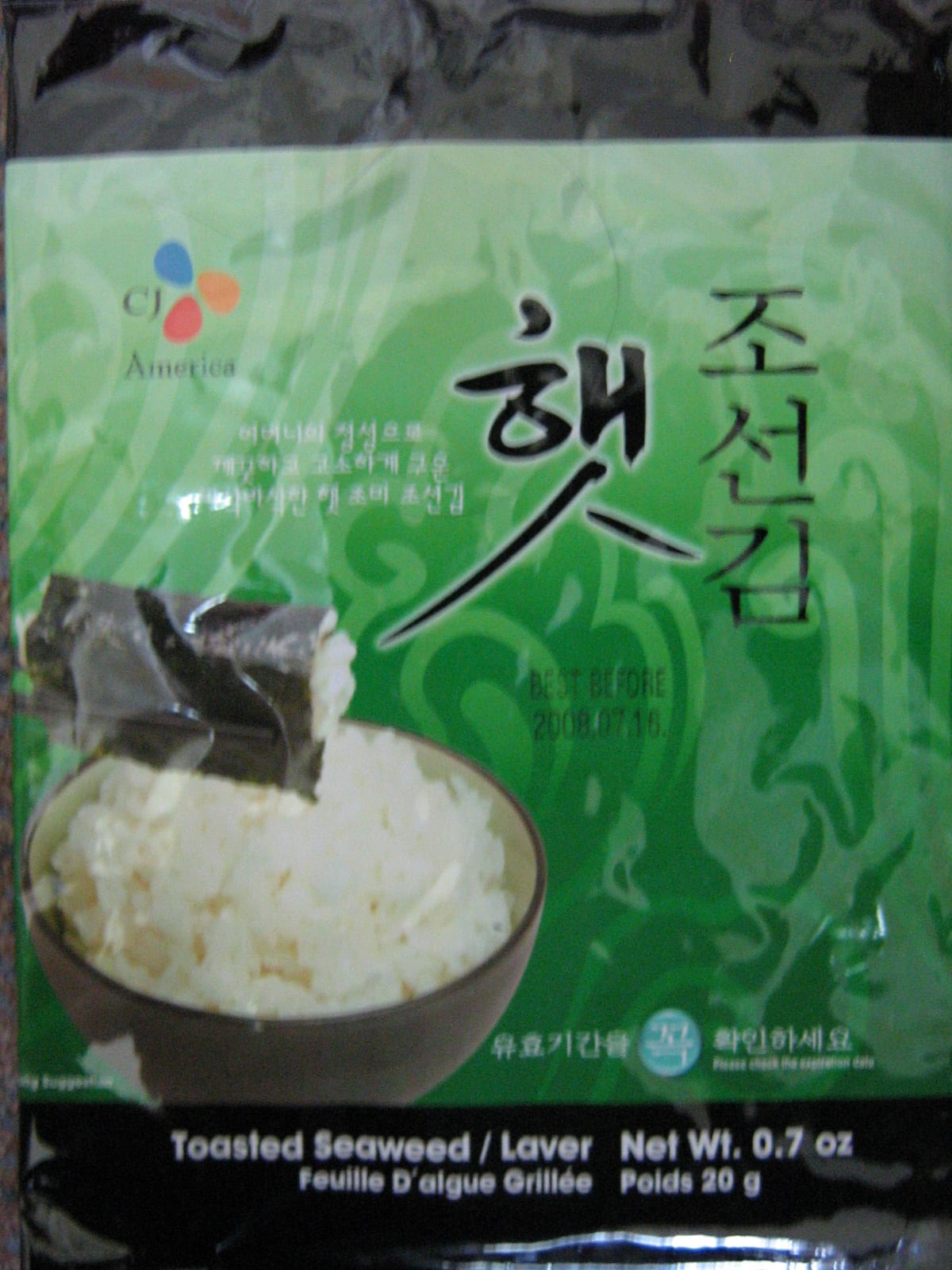 A package of Korean gim with Hangul packaging, showing how seasoned laver is often sold for rice and snacks.