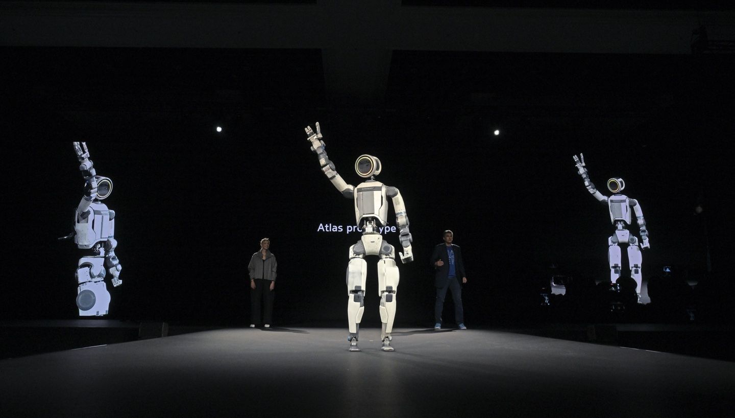 Boston Dynamics' Atlas humanoid robot appears onstage during Hyundai Motor Group's CES 2026 presentation.