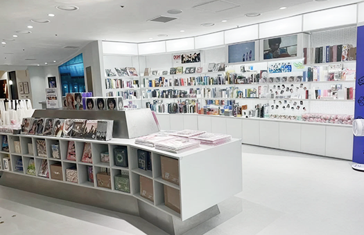 Bright books, albums, and K-pop merchandise displays at Youngpoong Bookstore Jongno.