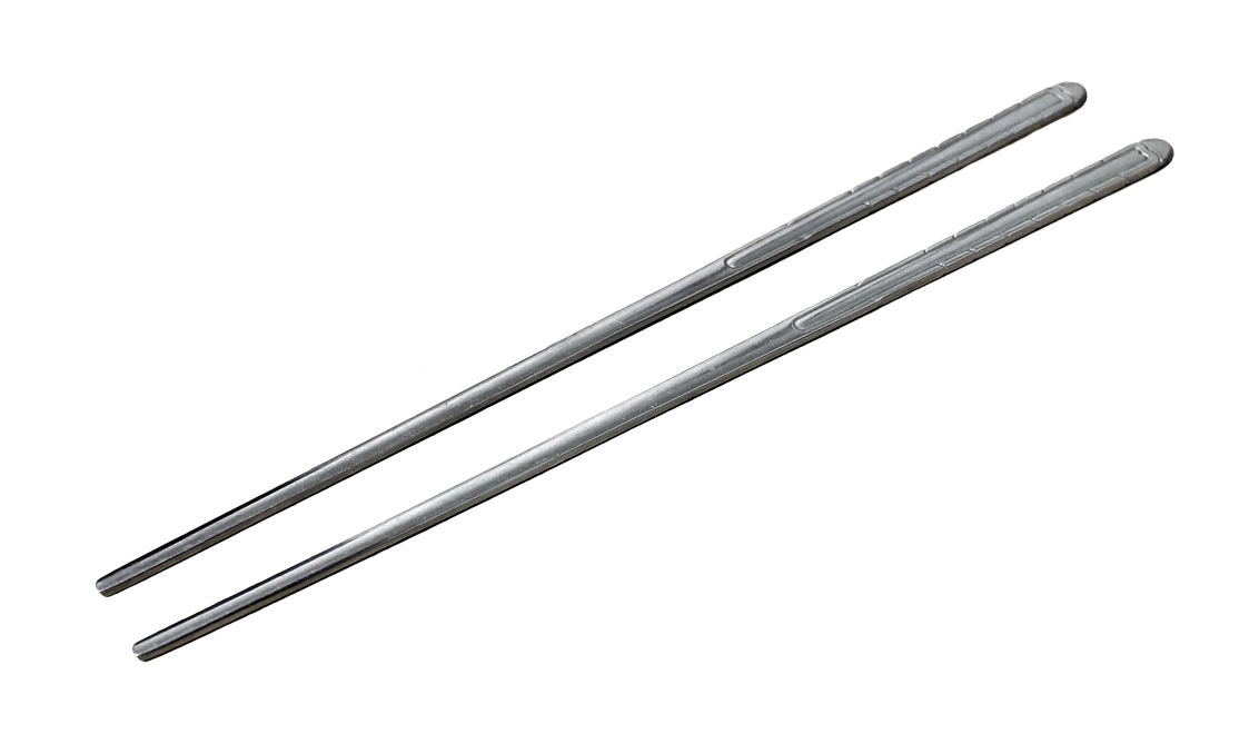 A pair of flat stainless steel Korean chopsticks isolated against a plain background.