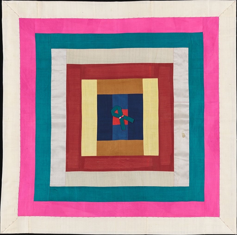 A framed silk bojagi demonstrates how wrapping cloth can also be collected and displayed as textile art.