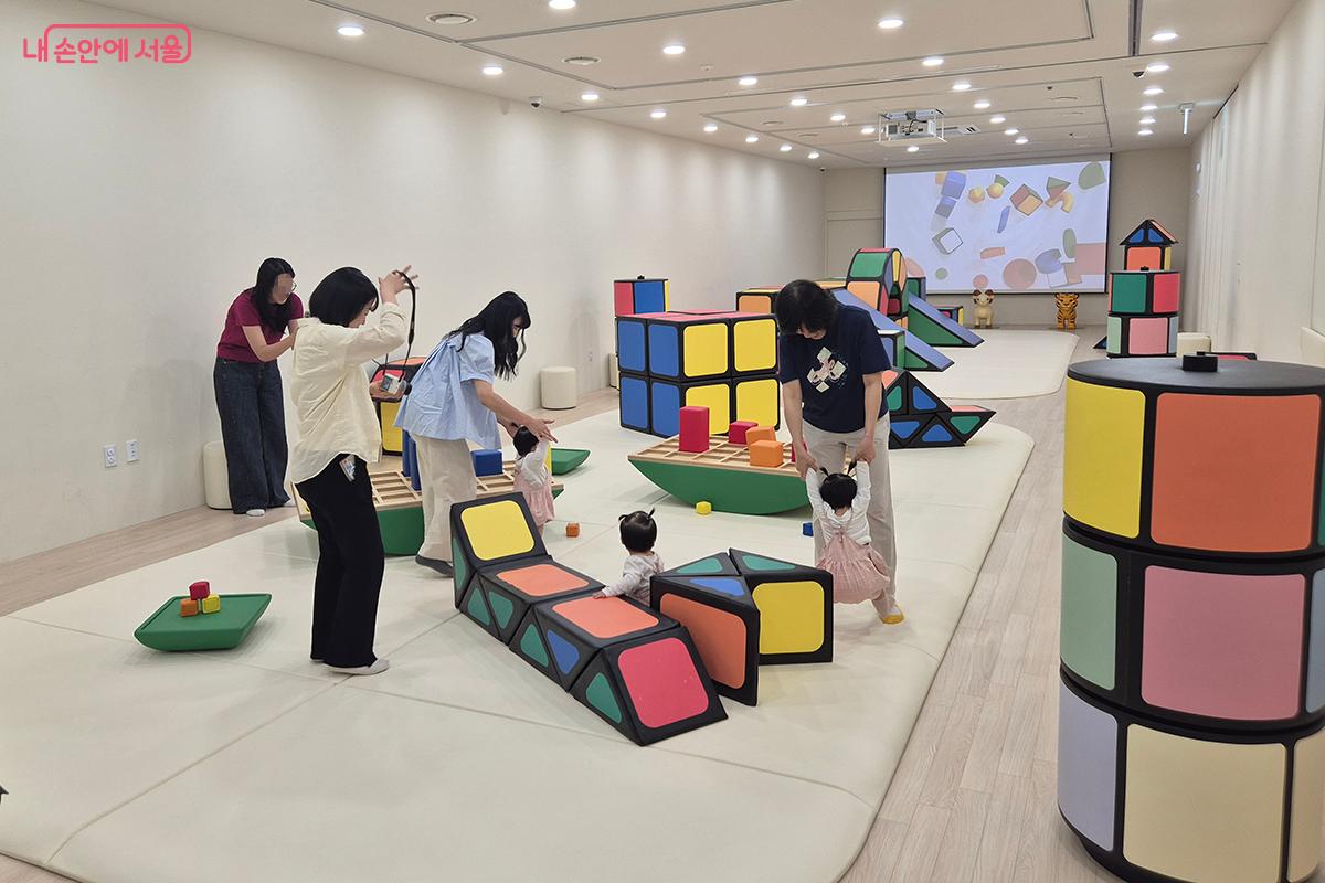 Children and guardians use the modular soft-play space at the Seoul Kids Cafe inside Hanseong Baekje Museum.