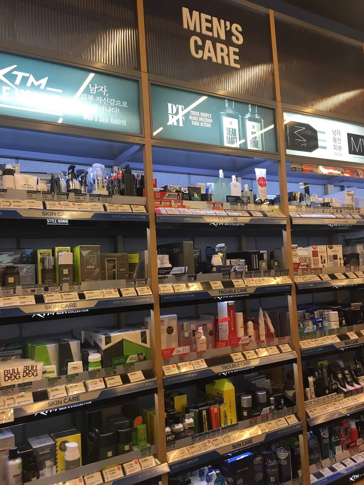 Skincare shelves in a South Korean drugstore with Korean signage and won price tags.