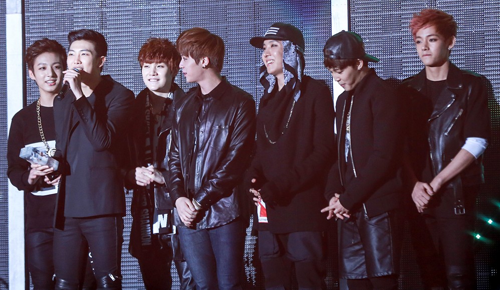 BTS accepting the Best New Artist award at the 2013 Melon Music Awards.