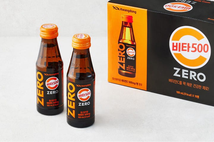 Two Vita 500 Zero bottles beside their box, labelled 무탄산음료 and 100 mL 0 kcal.