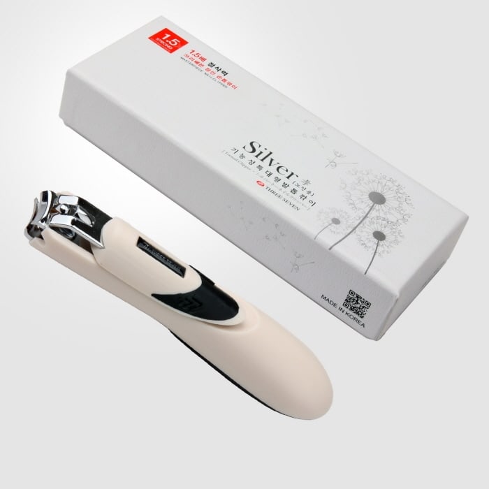 A Three Seven oversize toenail clipper in cream beside its white Silver-line gift box, with MADE IN KOREA printed on the box face next to a QR code.