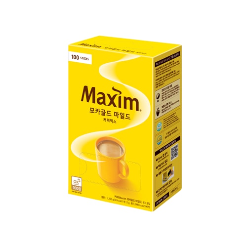 A yellow box of Maxim Mocha Gold Mild Korean coffee mix, 100 sticks, with Korean text 모카골드 마일드 커피믹스.