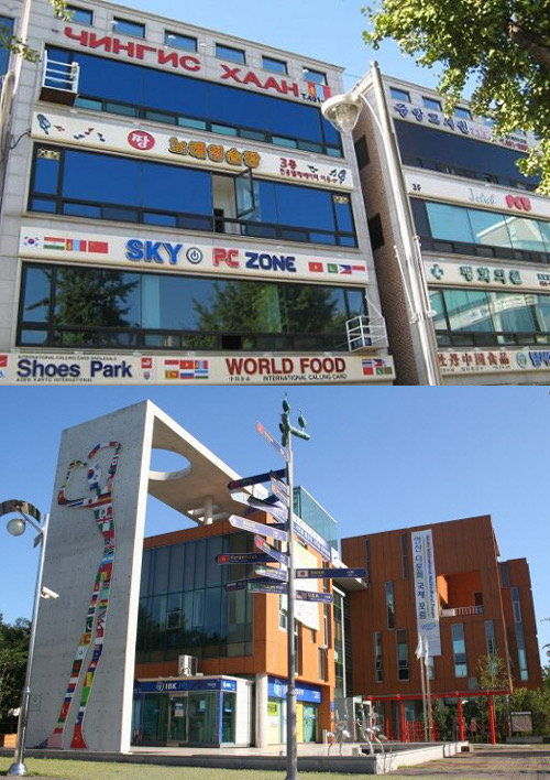 Wongok-dong in Ansan, Gyeonggi Province: the upper half shows a shop building with a Mongolian sign reading ЧИНГИС ХААН, Korean, Chinese and flag-decorated signs, a PC room and an international calling-card shop; the lower half shows a tall sculpture and a multi-arm direction post in front of brick buildings.